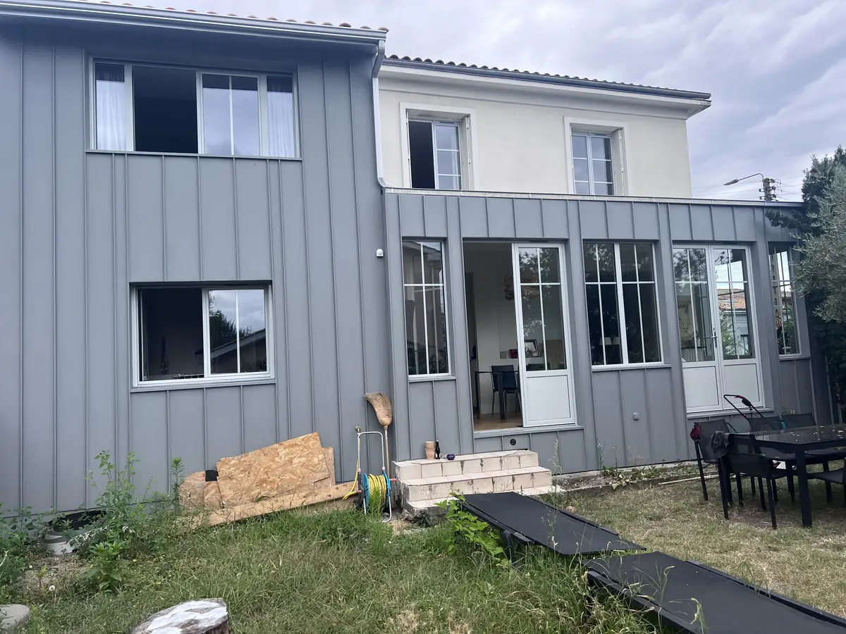 Extension bois avec bardage sur une maison